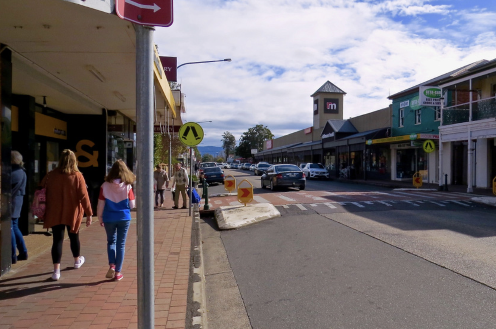 Shoppers on the footpath along Richmond's Windsor Street shopping strip, a Hawkesbury service area where Mould Hunters treats mould in homes and businesses