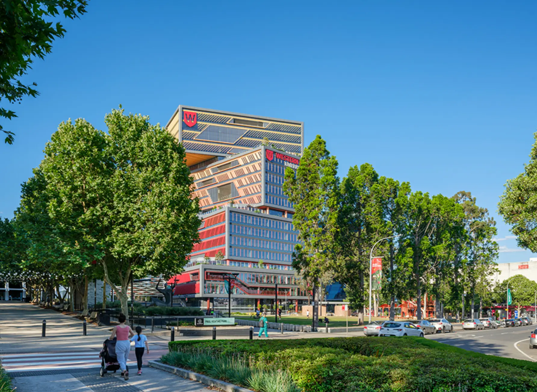 Bankstown CBD streetscape with the Western Sydney University building and tree-lined plaza, a service area where Mould Hunters treats mould in homes, units and commercial buildings